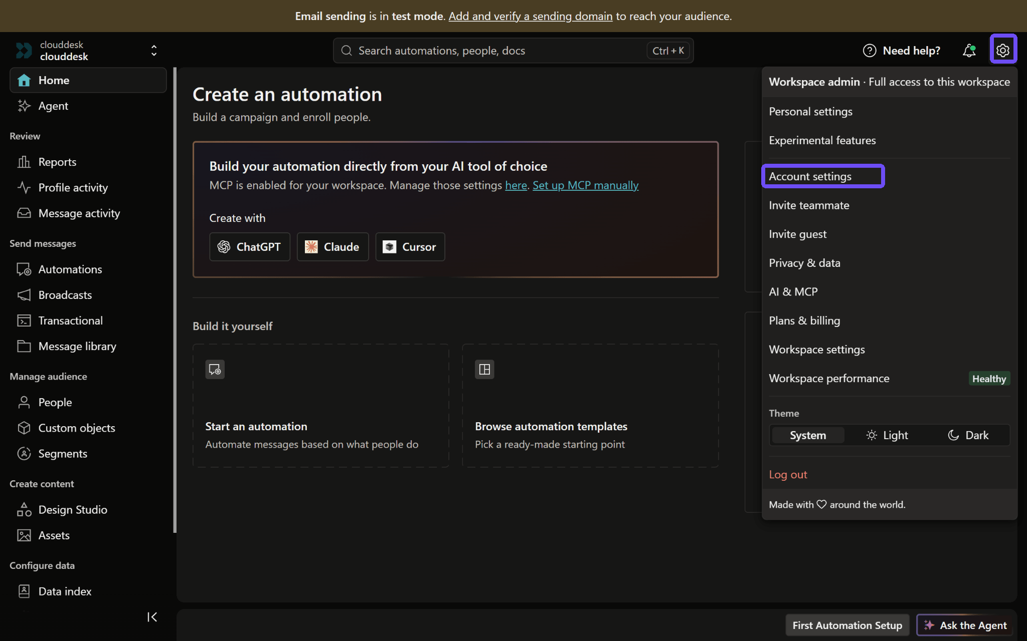 Customer.io: Settings gear and Account settings outlined.