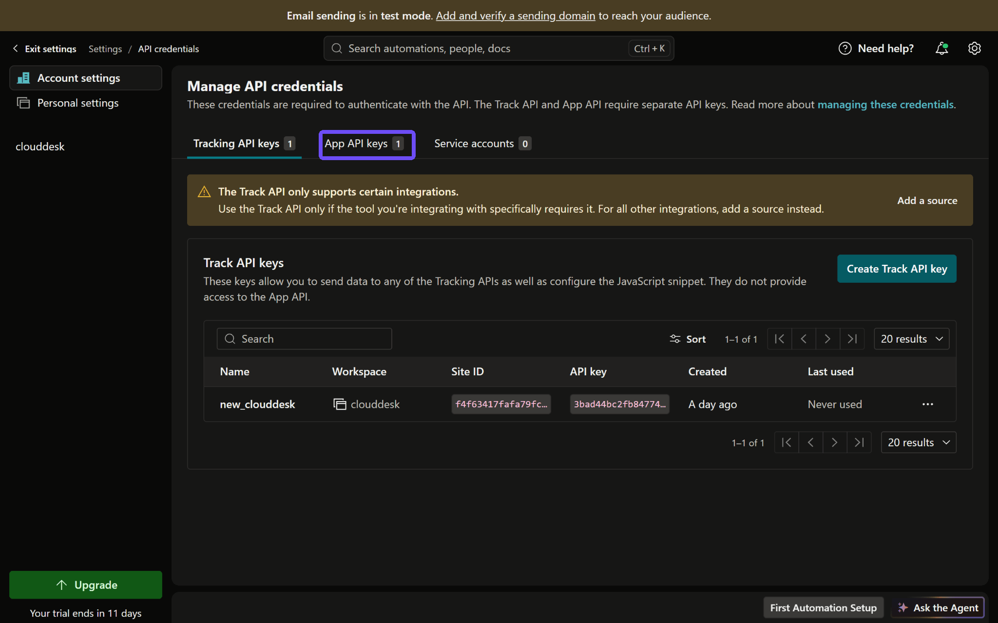 Customer.io: App API keys tab outlined in purple.