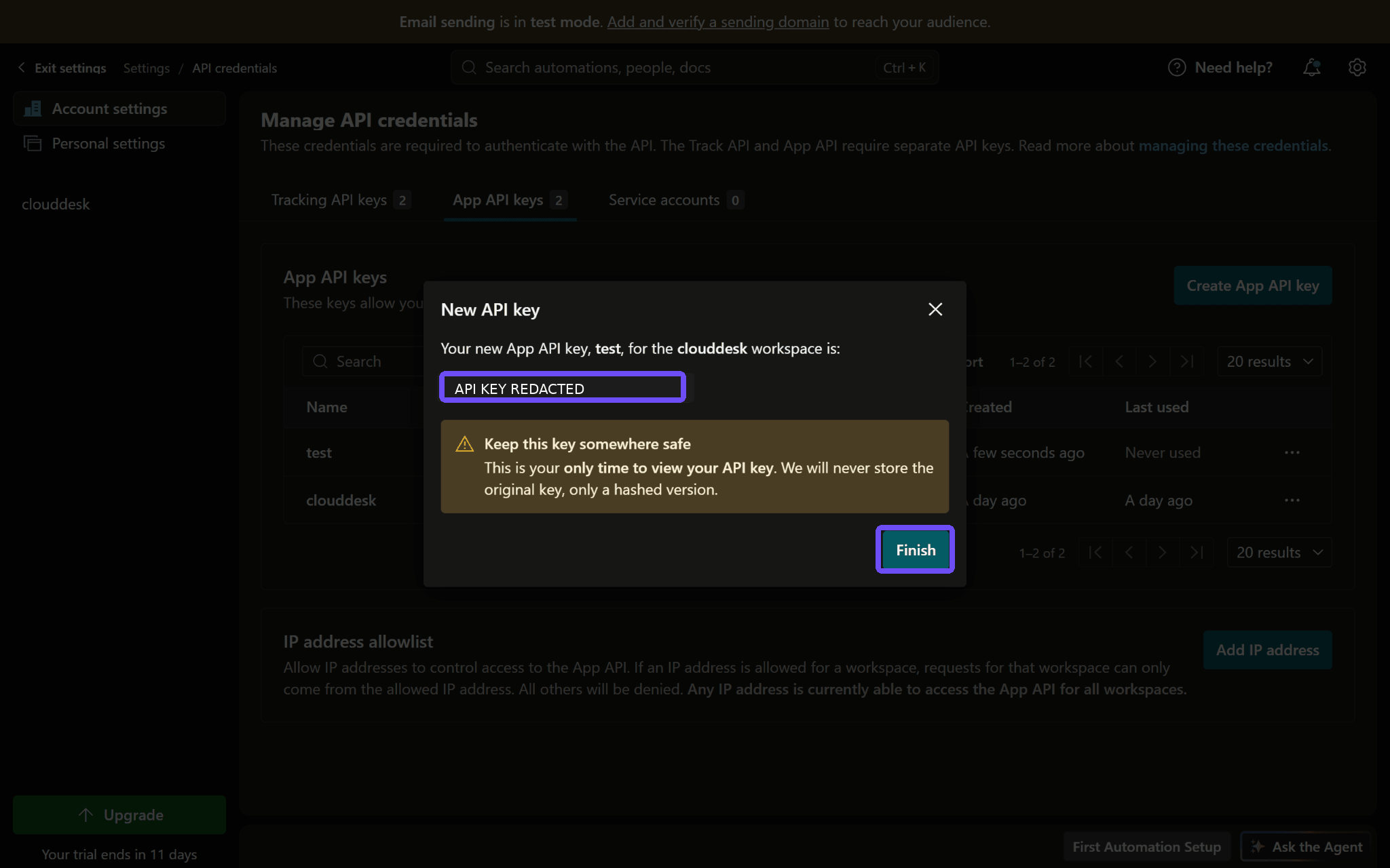 Customer.io: copy the one-time API key (redacted) and click Finish.